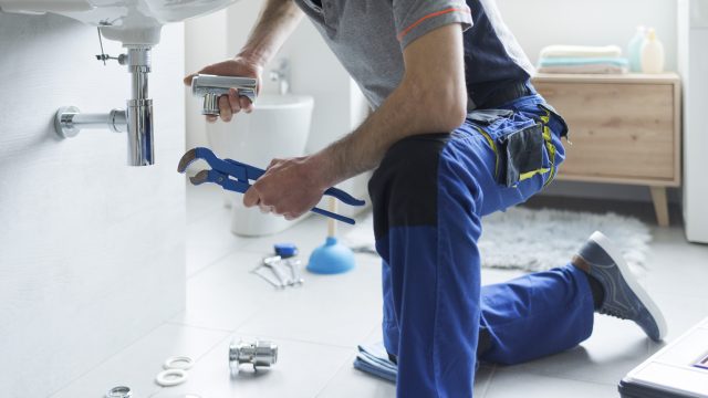 Plumber,Replacing,Sink,Pipes,At,Home,,Professional,Service,Concept
